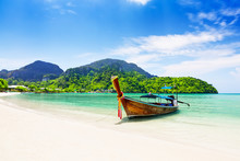 Thai Traditional Wooden Longtail Boat And Beautiful Sand Beach.