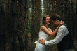 © ruslan1117 - bride and groom in the forest of firs