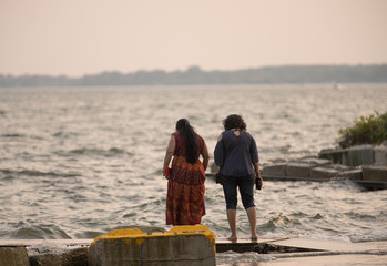 unknown women have spotted something floating in the water