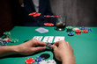© Ilnur - professional poker game. Green poker table with two games. poker player makes a bet by throwing chips on the table