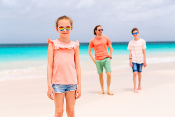 Father with kids at beach