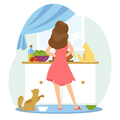 Girl is cooking in the kitchen whis her cats.