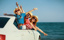 Happy Family Mother And Children Girls Goes To Summer Travel Trip In Car.