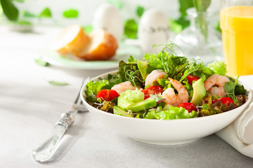 Wall Mural - Fresh summer salad with shrimp, avocado and tomato