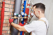 © Kadmy - plumber installing and mounting water equipment - meter, filter and pressure reducer