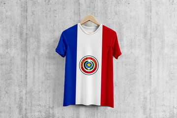 Paraguay flag T-shirt on hanger, Paraguayan team uniform design idea for garment production. National wear.