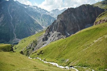 scenic alpine landscape with mountain and river