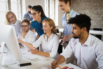 Creative business people working on business project in office