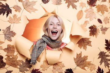 Wall Mural - Woman happy autumn in autumn park. Autumn mood and the weather are warm and sunny and rain is possible. Leaf fall. Autumn discounts on lingerie. Sale of womens panties. Fashion girls.