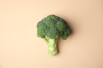 Fresh green broccoli on color background, top view. Organic food