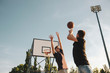 © phoenix021 - Basketball, teen shooting on basket , in action outdoors