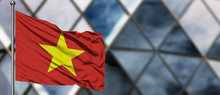 Vietnam Flag Waving In The Wind Against Blurred Modern Building. Business Concept. National Cooperation Theme.