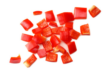 cut slices of red sweet bell pepper isolated on white background top view