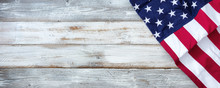 United States Flag Of America On White Rustic Wooden Background With Plenty Of Copy Space