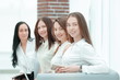© yurolaitsalbert - group of successful business woman sitting in office hall.photo with copy space