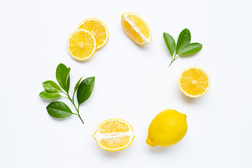 lemon and slices with leaves isolated on white.