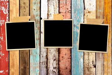 Canvas Print - Three retro photos on old wooden wall