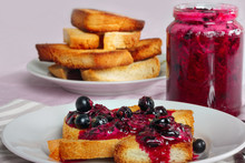 Delicious Toasts Bread With Homemade Currant Jam With Fork And Knife
