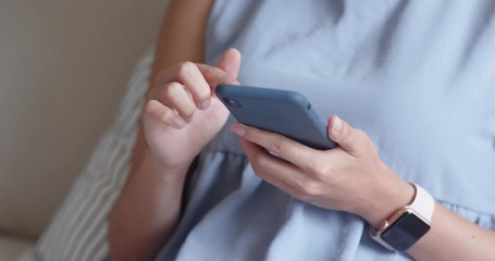 Wall Mural - Close up of woman use of mobile phone