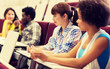 © Syda Productions - education, high school, university, learning and people concept - group of international students talking in lecture hall