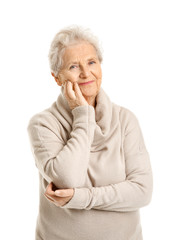 Poster - Portrait of senior woman on white background