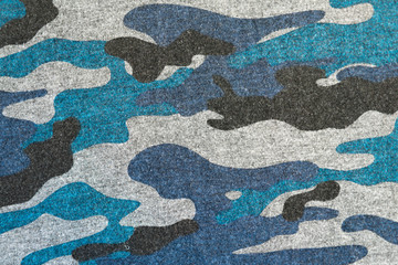 Blue black camouflage fabric texture background