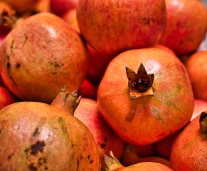 pomegranates on a black background