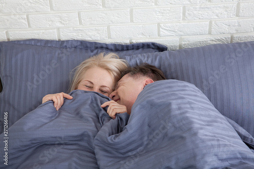 Middle Aged Cute Couple Sleeping Together In Bed Kaufen