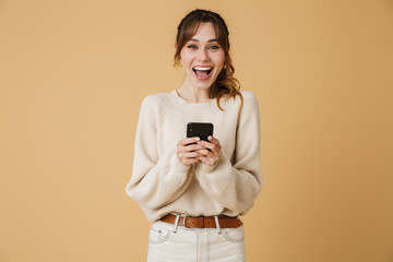 Poster - Beautiful young woman wearing sweater standing