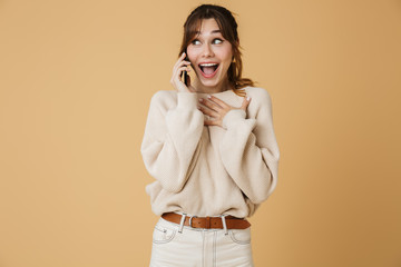 Canvas Print - Beautiful young woman wearing sweater standing