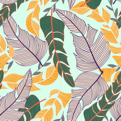 Seamless pattern with bright tropical leaves and plants on white background. Vector design. Jungle print. Textiles and printing. Floral background.