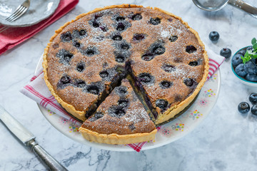 Wall Mural - Blueberry and almond tart dusted with icing sugar