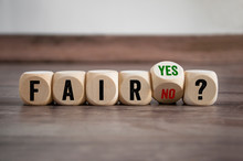 Cubes And Dice With Fair Yes Or No On Wooden Background
