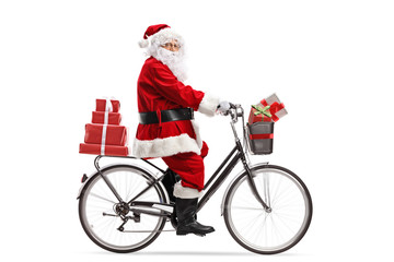 Sticker - Santa Claus riding a bicycle