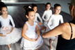 © NDABCREATIVITY - Group of fit happy children exercising ballet in studio together