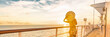 Cruise summer vacation woman watching sunset on deck banner panorama - Caribbean tropical landscape travel lifestyle.