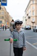 © alas_spb - little boy riding scooter in the city, sport
