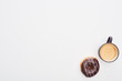 © LIGHTFIELD STUDIOS - top view of tasty glazed chocolate doughnut and cup with coffee on white background with copy space