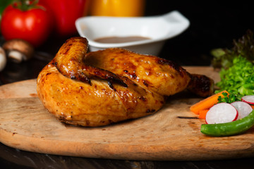 Sticker - Roast chicken on cutting board with raw ingredients