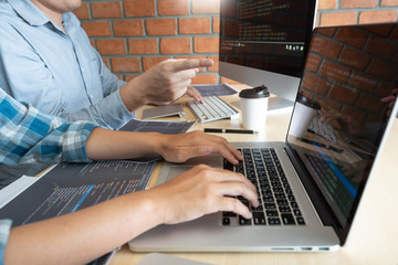 Wall Mural - collaborative work software engineers website developer technologies or programmer working coding on