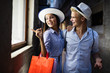 © NDABCREATIVITY - Happy attractive loving couple enjoy shopping together