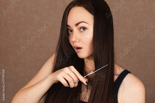 Girl Cuts Long Dark Hair Buy This Stock Photo And Explore