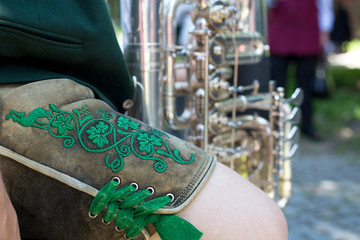 Close-up of man in traditional bavarian Lederhosen