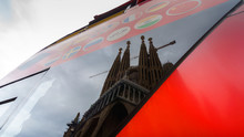 BARCELONA, SPAIN - NOVEMBER 09, 2018 - La Sagrada Familia Church Reflecting In The Tourist Double Decker Bus Front Window