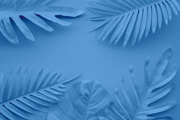 collection of tropical leaves,foliage plant in blue color with space background