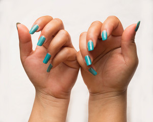 B.autiful close up of hands of a young woman.