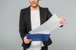 © LIGHTFIELD STUDIOS - partial view of mixed race businesswoman holding clipboard with paper isolated on grey