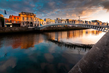 Ha'penny Bridge Is Over River  Liffey  In Sunset, Dublin, Ireland