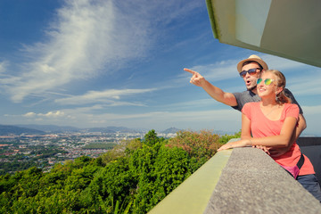 Wall Mural - Woman and man enjoying the view.