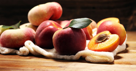 Wall Mural - A group of ripe peaches on table